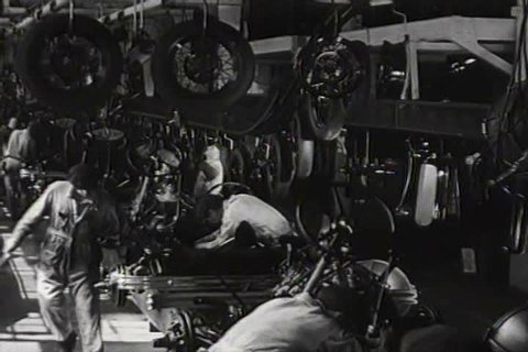 1930s - Very good shots of Ford factory workers assembling automobiles in 1932.