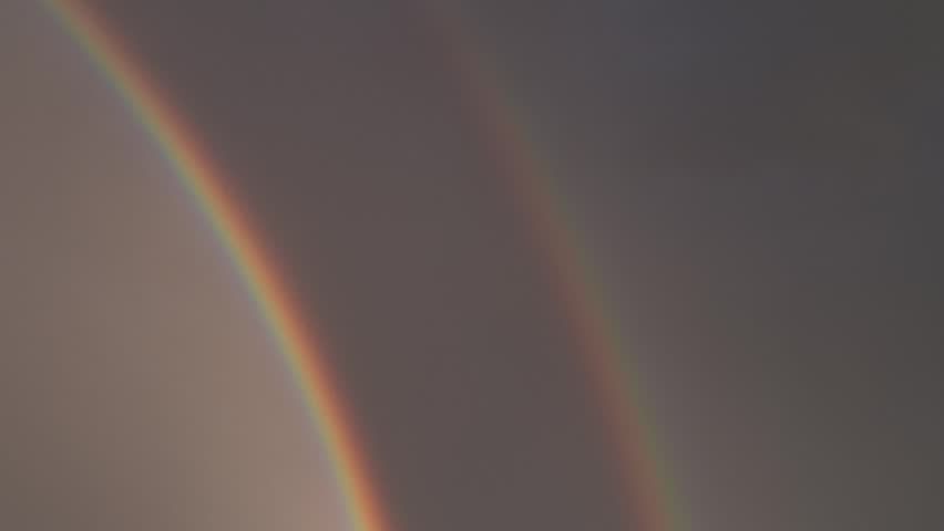 Vivid Double Rainbow After Rainstorm