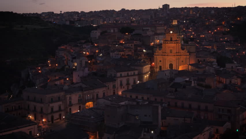 dusk flying left view of Ragusa Ibla in Sicily