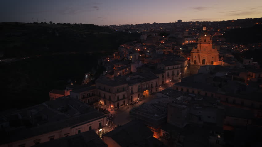 dusk curving over piazza towards duomo of Ragusa Ibla in Sicily