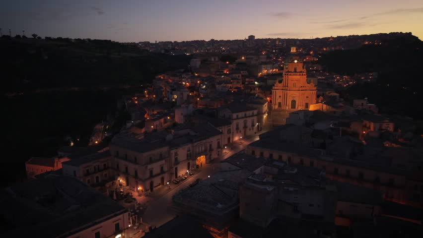 alt dusk curving over piazza towards duomo of Ragusa Ibla in Sicily