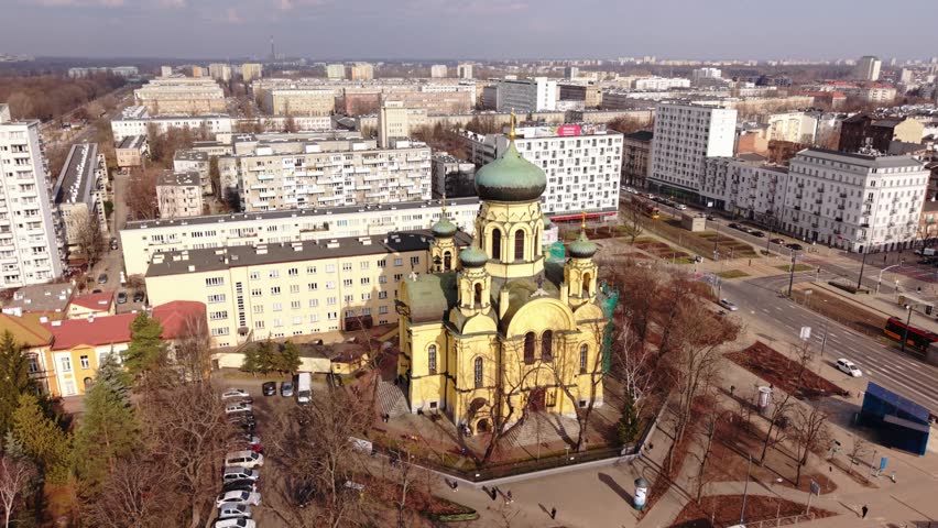 Close Aerial Look Warsaw Church Showcasing Architectural Details, Architect Perspective Examining Domes And Ornate Facade, Courtyard Layout, Nearby Modern Towers, Calm Contemplative