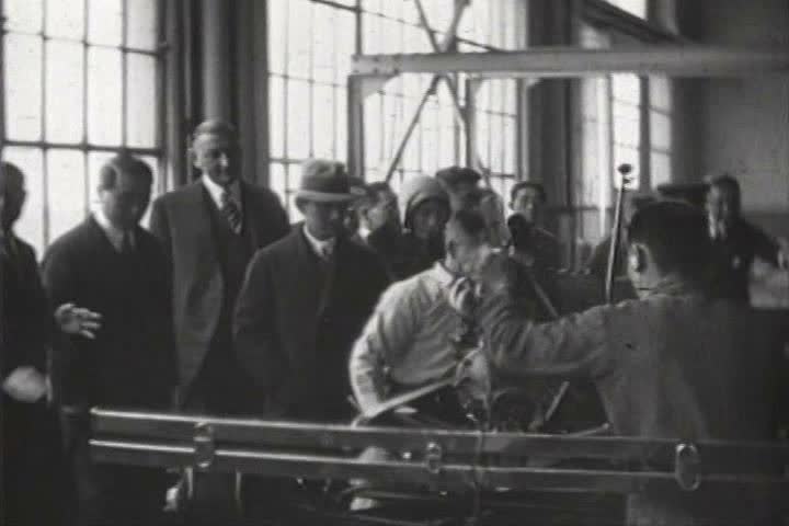 1930s - Workers in a Ford automobile factory in Japan in 1931 and Emperor Hirohito visits.