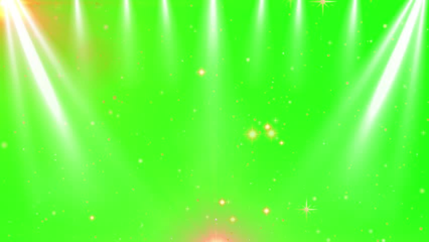 Bright green stage lighting creates a vibrant atmosphere in a concert or event setting.