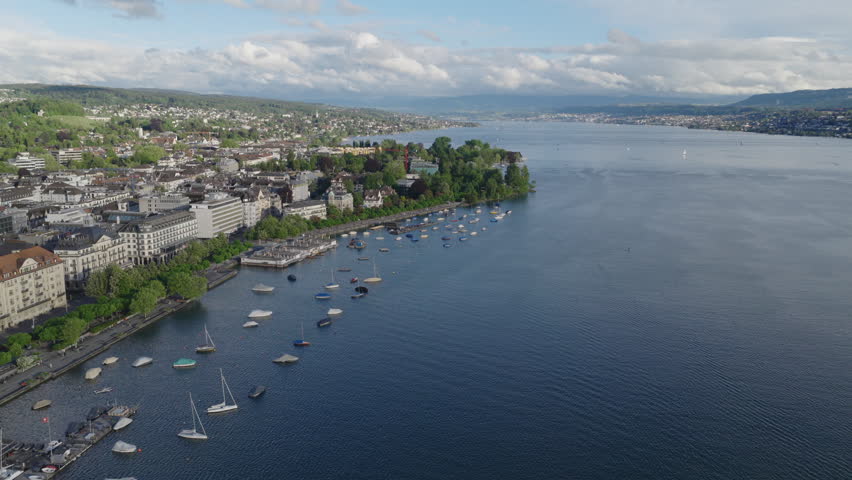 Establishing aerial view of Zurich skyline, stunning perspective of largest city in Switzerland.