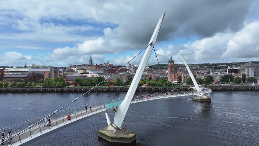 Aerial view of The Peace Bridge over the Foyle River in Londonderry, Northern Ireland
