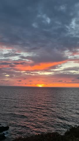 Captivating sunset scenes over the ocean horizon.