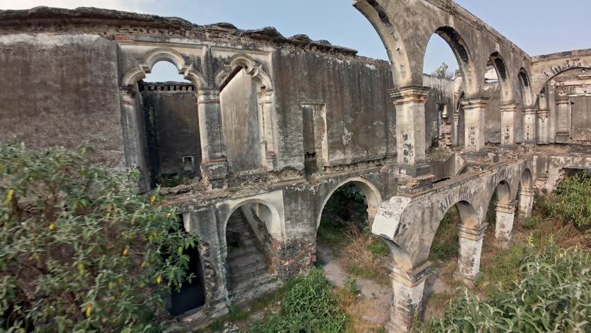 Fpv drone flying through the ancient, overgrown ruins of the historic ex hacienda de caxcantla