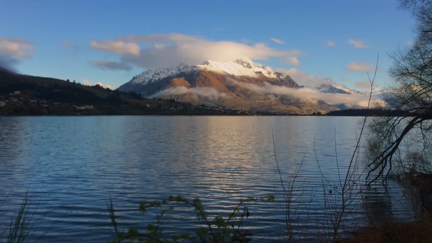 Lake Wakatipu fog Frankton Kelvin Heights Queenstown Winter sunrise sunset South Island New Zealand landscape nature view Walter Peak Remarkables snow covered peaks Frankton Beach Lake Willow Islet