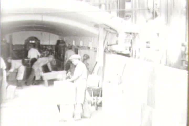 1920s - Stonemasons and bricklayers at work in 1924.