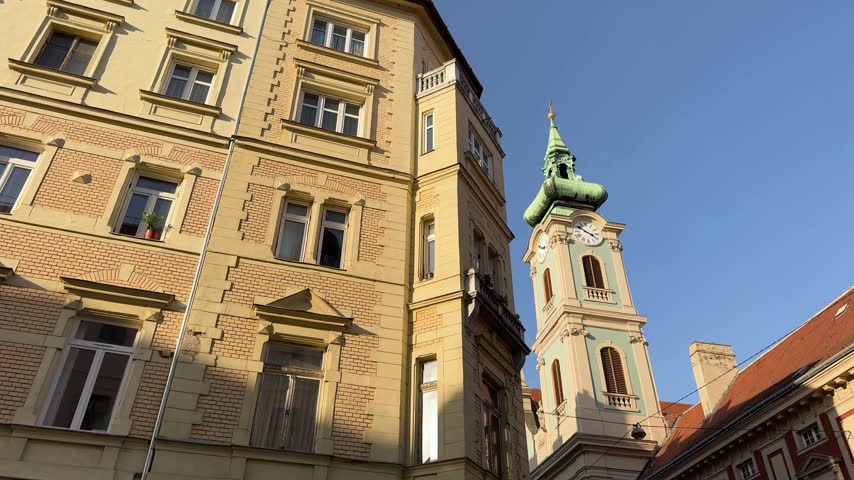 Low angle tracking shot of Church of the Wounds of St. Francis, Budapest