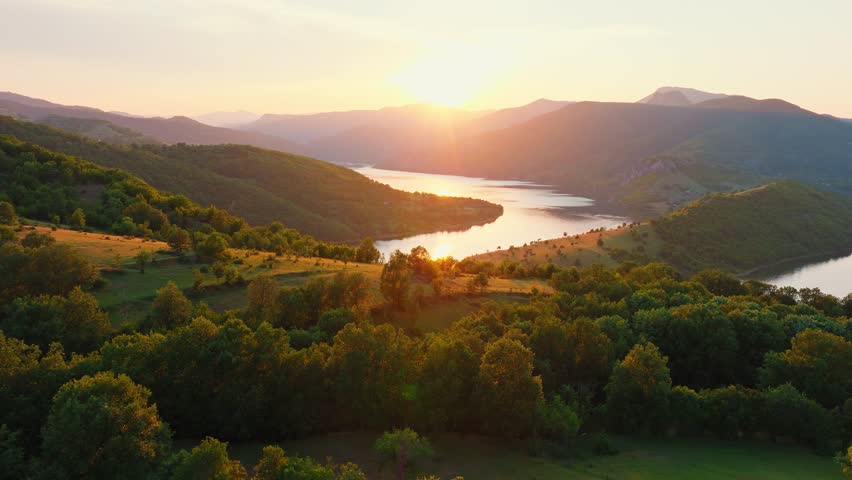 Kardzhali Bulgaria Drone Panorama Lake Rhodope Mountains Golden Sunset Sun Rays Green Forest Reflection Winding River Travel Tourism Nature Cinematic Landscape Adventure 