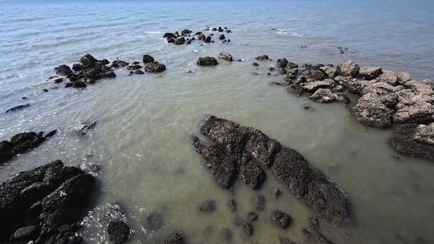 Scenic coastal landscape  crashing waves  rocks
