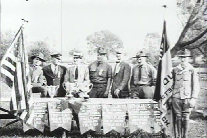 1920s - The Boy Scouts meet, march and earn merit badges in 1920.