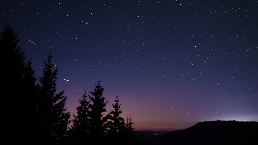 Milky Way stars on a dark countryside skies. Time-lapse video.