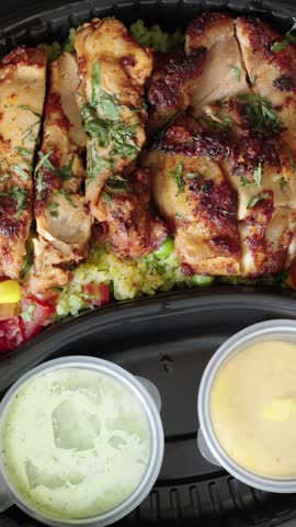Healthy Chicken Lunch Box With Rice And Sauces, Protein Nutrition And Meal Prep Delivery Concept, Vertical Video