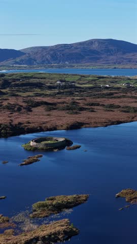 Aerial of the historic Ringfort at Lough Doon, Portnoo, County Donegal, Ireland