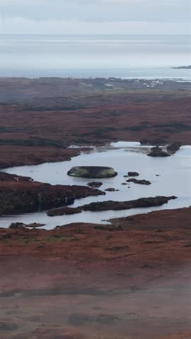 Aerial of the historic Ringfort at Lough Doon, Portnoo, County Donegal, Ireland