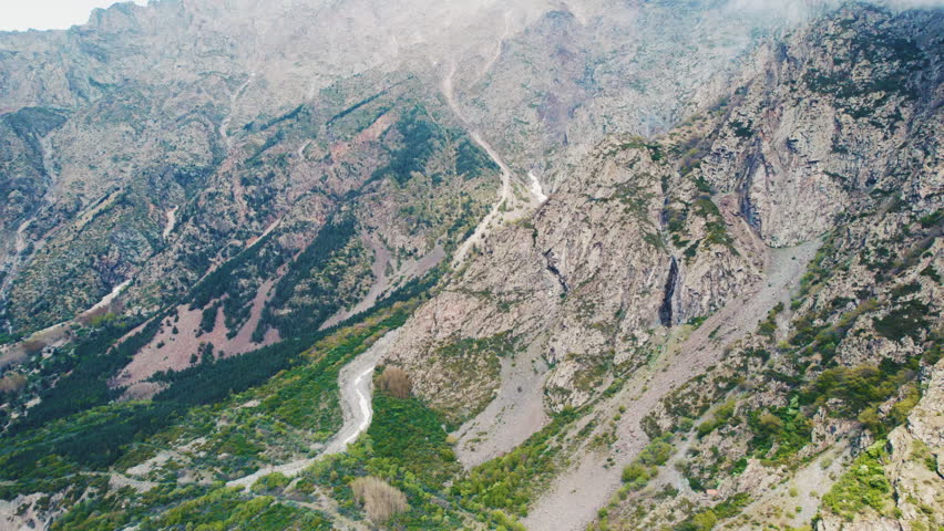 Winding river flowing through a deep rocky gorge