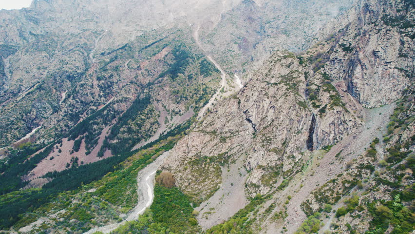 Aerial view of a mountain valley with a river