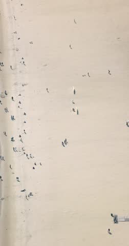 Haeundae beach, Busan, South Korea, aerial view with Busan bay, Songnim Park, Haeundae-gu district, white sand beach promenade, sea with Dongbaekseom Island, Gwangan bridge and Busan skyline panorama