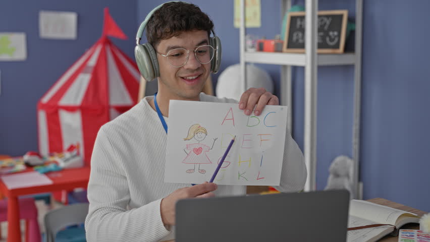 Man teacher holds children