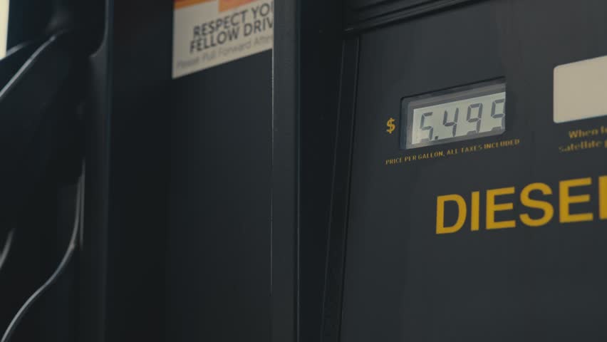 Rising diesel fuel price at the gas station pump