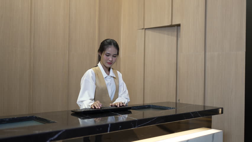 Female employee is working at cinema complex during. Occupation, part time jobs.