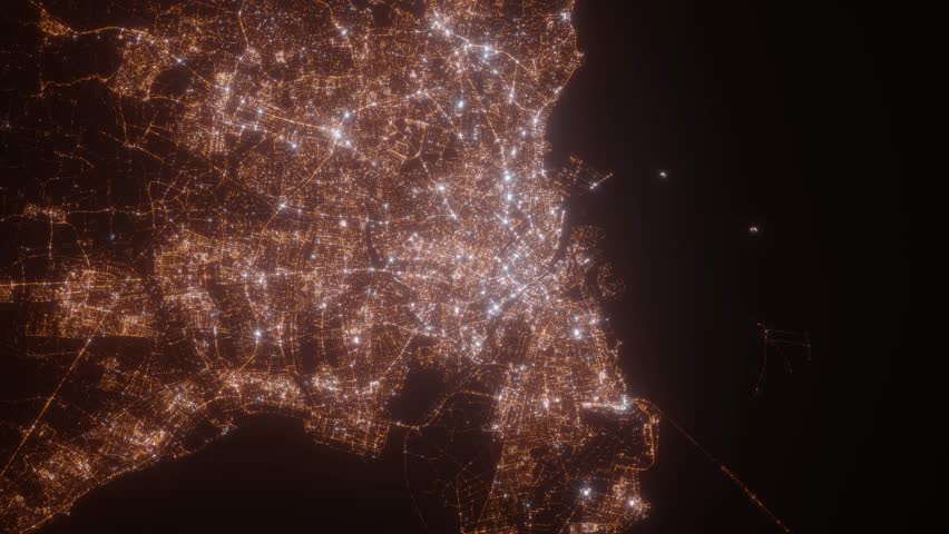 Copenhagen (Denmark) aerial view at night. Top view on modern city with street lights. Camera is zooming out, rotating clockwise