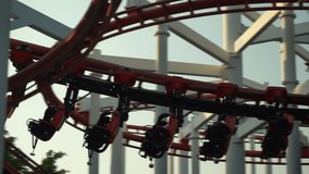 Ride a roller coaster at an amusement park. - Powered by Shutterstock - Get 15% off with code: PIKWIZARD15
