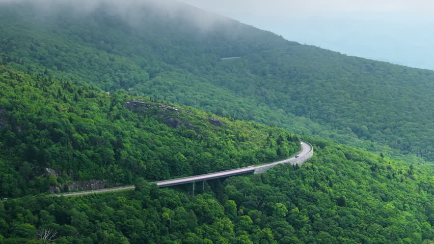 Mountain pass road in North Carolina Appalachian mountains, USA. Blue Ridge Parkway in summer rain season
