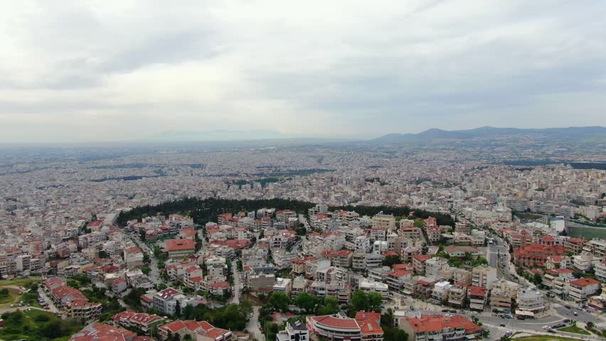 Aerial view of Coastal city of Thessaloniki, Greece. Top View of Buildings and Sea 