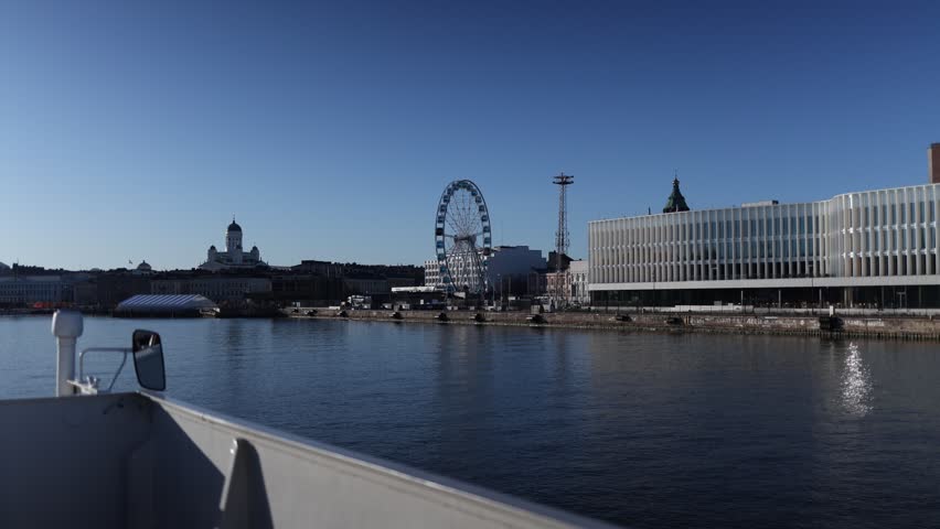 Large ship approaching city waterfront with ferris wheel and orthodox church cinematic harbor atmosphere peaceful urban travel scene realistic marine transportation during daylight