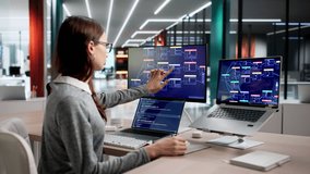 Woman Focused On Programming Using Nodes In Quiet Office. - Powered by Shutterstock - Get 15% off with code: PIKWIZARD15