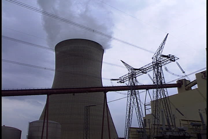 Tower spewing smoke, pan across power lines to distant transformers in Rockport, Indiana.
