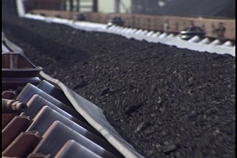 Coal moves past on conveyor in Rockport, Indiana