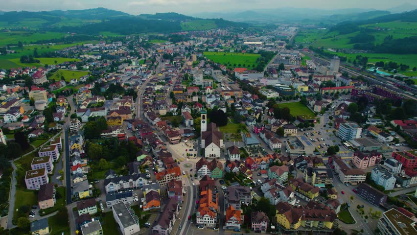Aerial view around the city Gossau in Switzerland on a overcast day in summer.