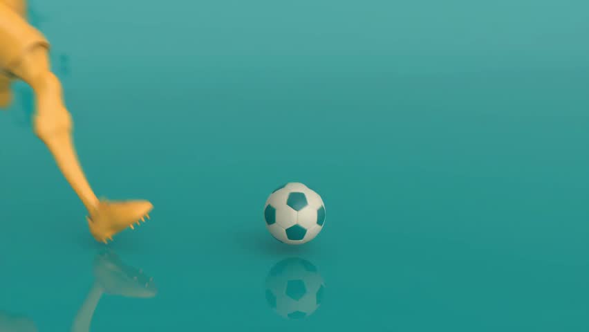 Football player kicking soccer ball on reflective surface.