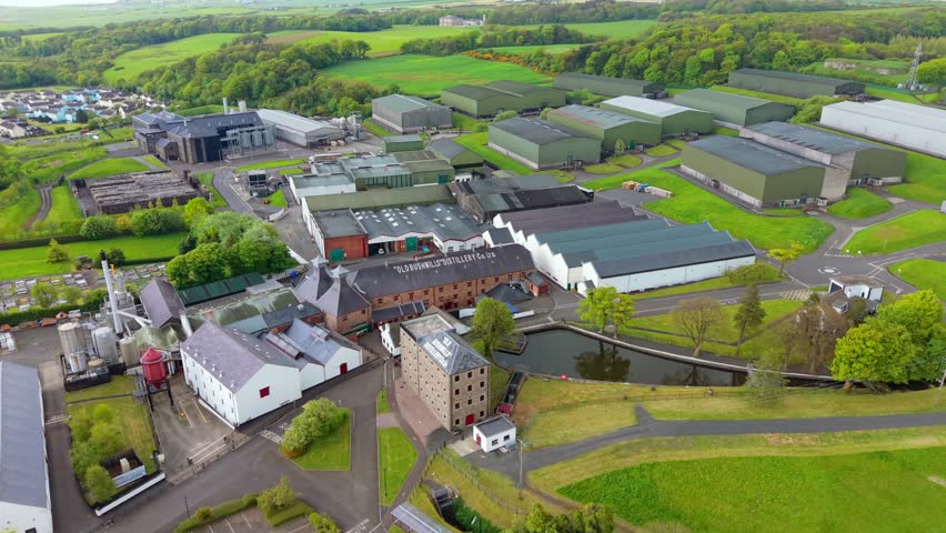 Rotating 4K 60FPS aerial of Old Bushmills Distillery in Bushmills, County Antrim in Northern Ireland. Produced in 3840x2160 with Rec709 color.