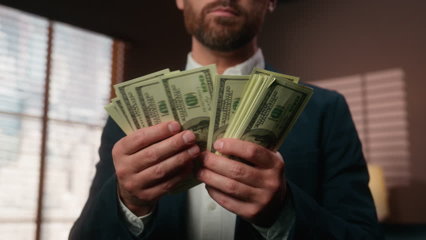 Close up cropped view Caucasian middle-aged business man counting cash in company corporate office mature businessman male agent count money good result sales salary savings betting reward jackpot