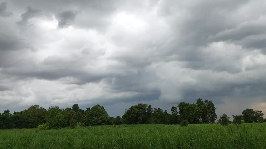 Dark Rain Clouds Over Countryside Landscape