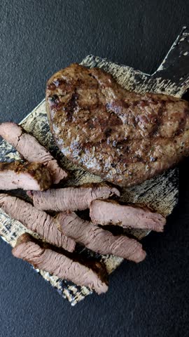 Food, grilled beef steak, roast meat for lunch. Grilled beef steak as a food background for your design