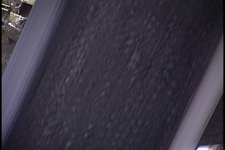 METROPOLIS, ILLINOIS - MAY 20, 1999: Coal spilling down chute, zoom out to show coal operations at Cook Coal Terminal.