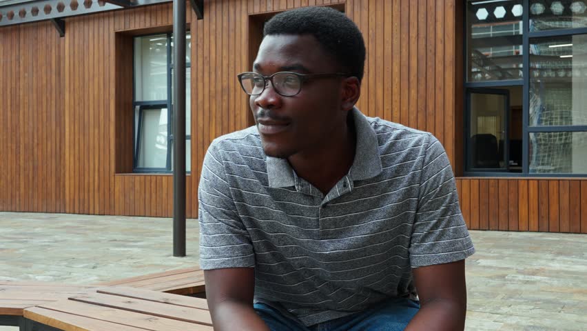 Man talks about his experiences in a community center in the afternoon