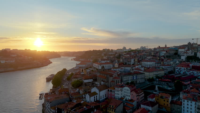 Aerial View of illuminated Porto city. Dom Luis bridge, Portugal