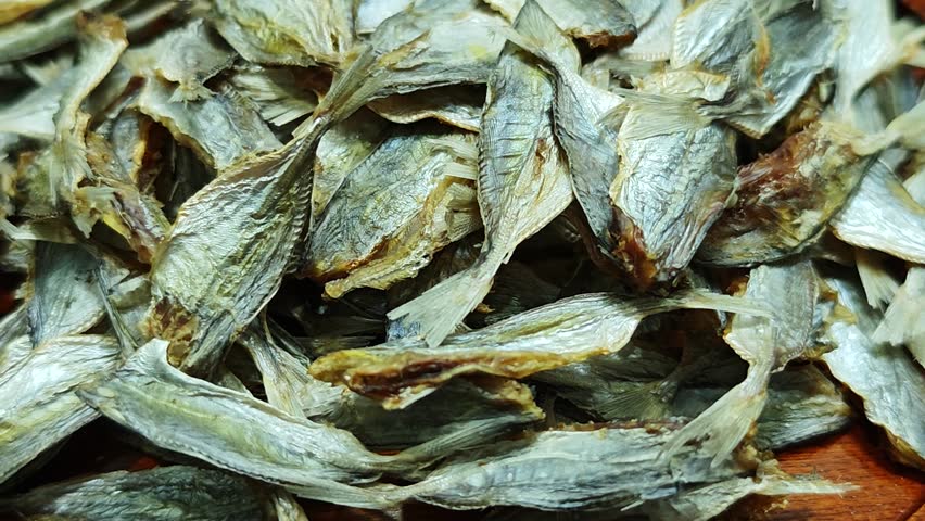 Dried sea fish on a basket.