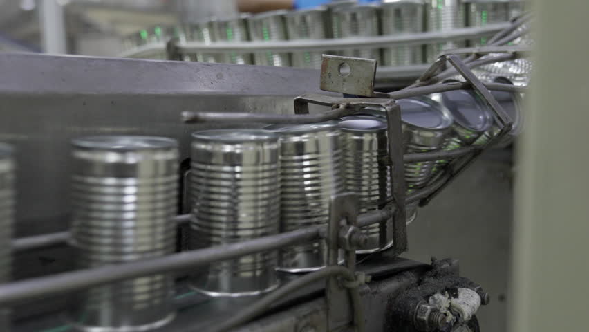 Food factory automated production line, Industrial canned food production line with metal silver can conveyor factory, automated packaging machinery and industrial processing with stainless steel