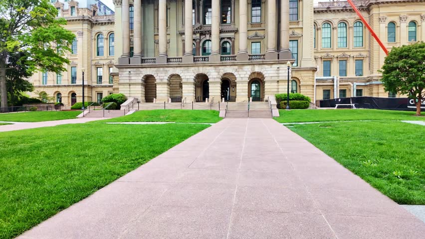 Illinois State Capitol building surrounded by spring greenery in Springfield Illinois