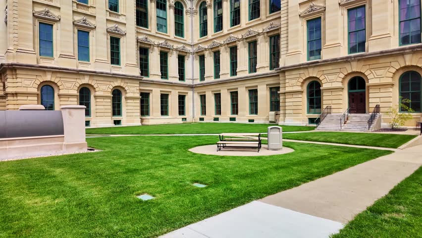 Illinois State Capitol building surrounded by spring greenery in Springfield Illinois