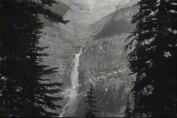 1910s - Hikers admire the waterfalls in Canada